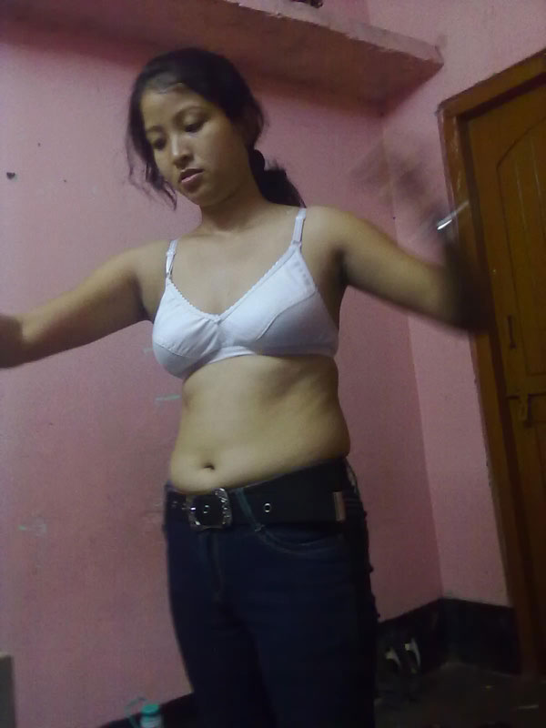 Pic gal 257. Young nepali wife changing in bedroom caught on